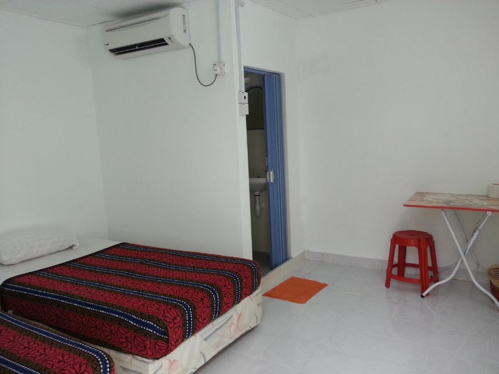 Et Budget Guest House Batu Ferringhi Szoba fotó