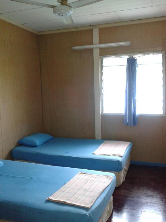 Et Budget Guest House Batu Ferringhi Szoba fotó